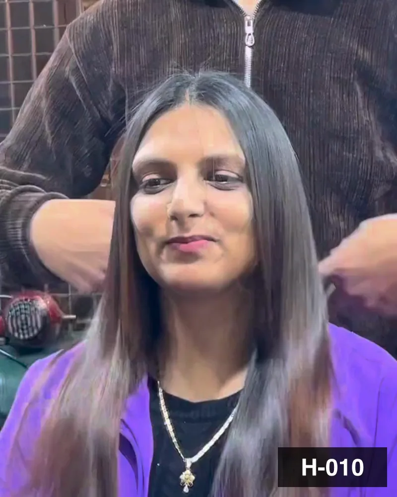 Long straight hair worked through at the chair, the guest facing the camera at Salon By Babita, Haldwani — reference H-010