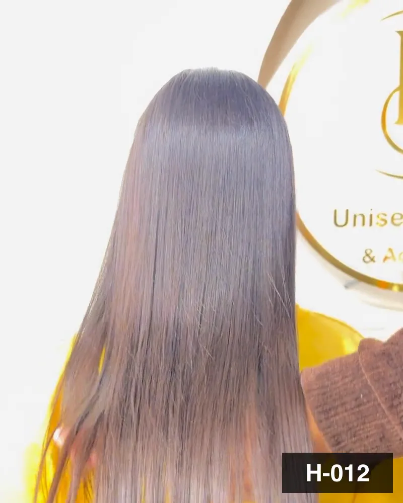 Extension wefts held against the hair and then the finished length, seen from behind at Salon By Babita, Haldwani — reference H-012