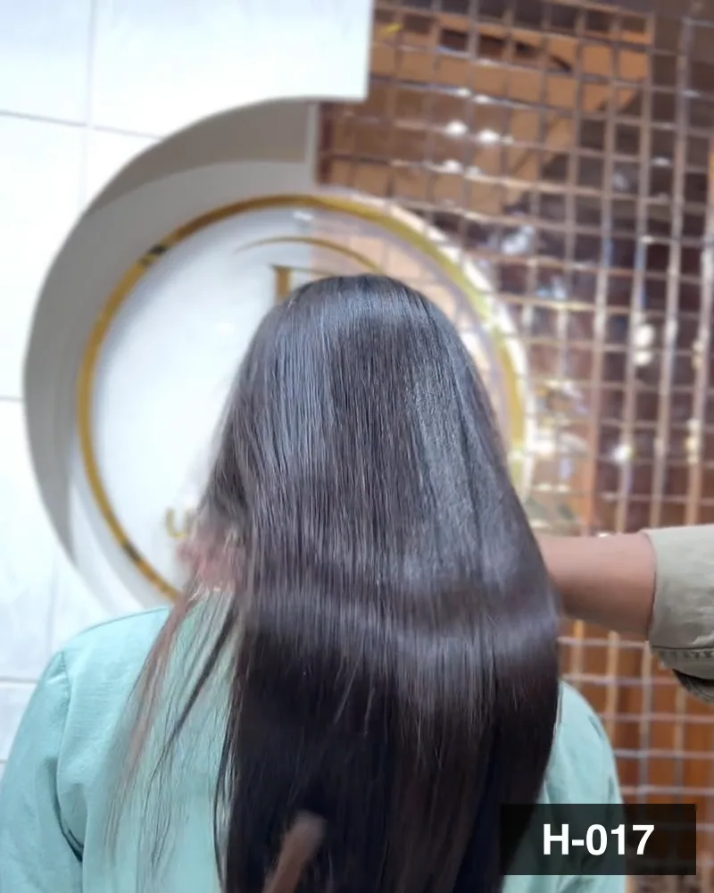Long hair held out from the shoulder to show its full smoothed length, seen from behind at Salon By Babita, Haldwani — reference H-017