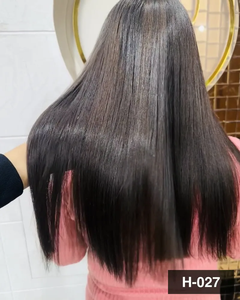 Long hair with a blunt line at the ends, brushed straight and seen from behind at Salon By Babita, Haldwani — reference H-027