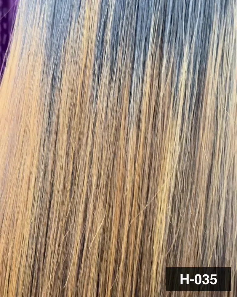 Long hair carrying blonde highlights through the length, seen from behind at Salon By Babita, Haldwani — reference H-035