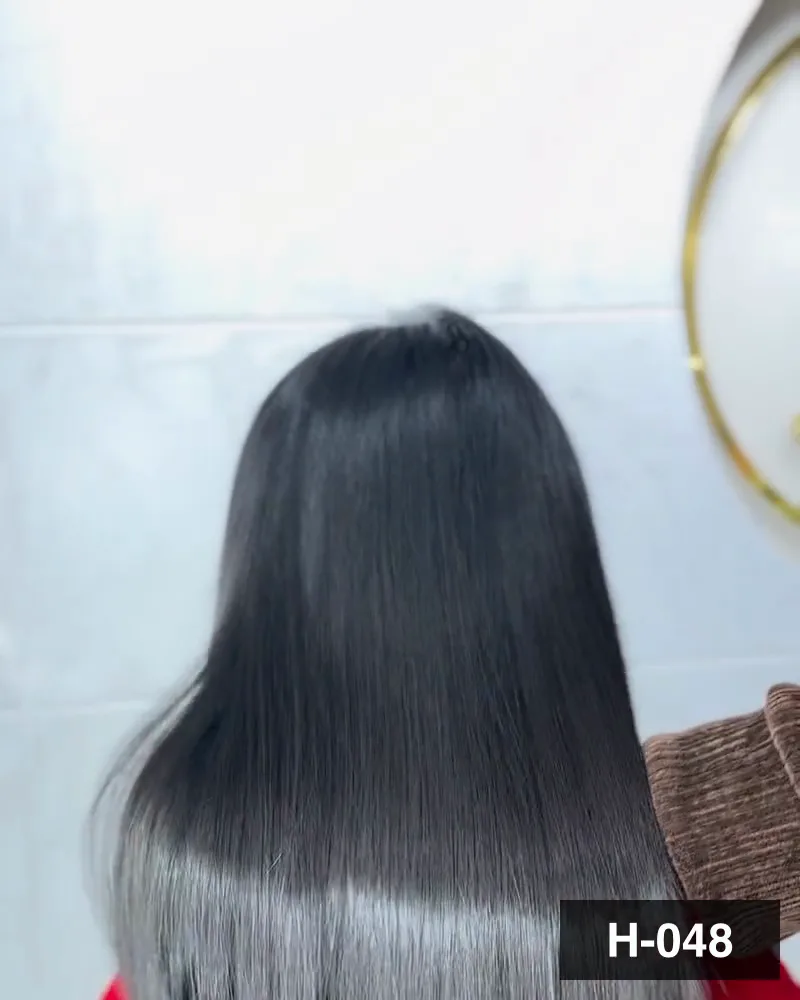 Extension wefts held to the hair and then the finished length, seen from behind at Salon By Babita, Haldwani — reference H-048