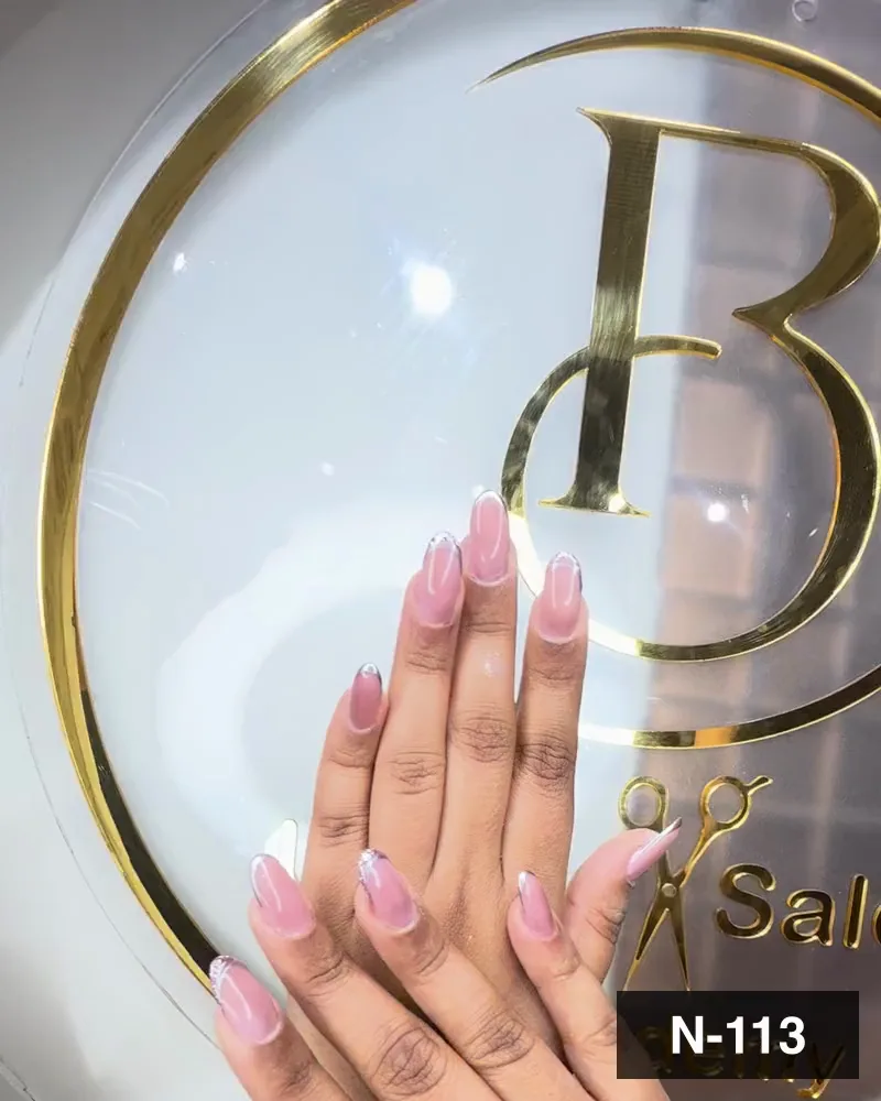 A nude pink french long square nail set on both hands at the monogram glass at Salon By Babita, Haldwani — reference N-113