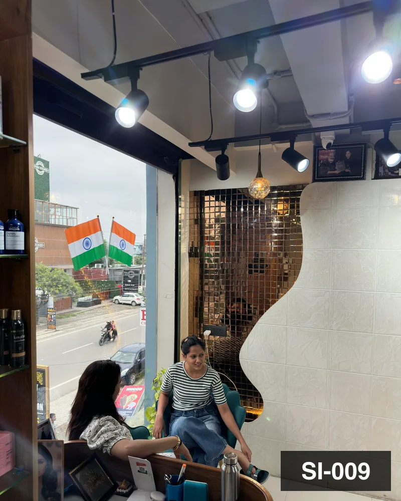 The window seating at Salon By Babita, Haldwani, on an ordinary working afternoon — reference SI-009