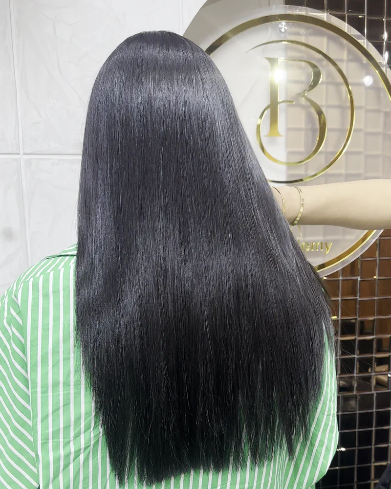 Long straight black hair falling past the shoulders, photographed from behind at Salon By Babita, Haldwani