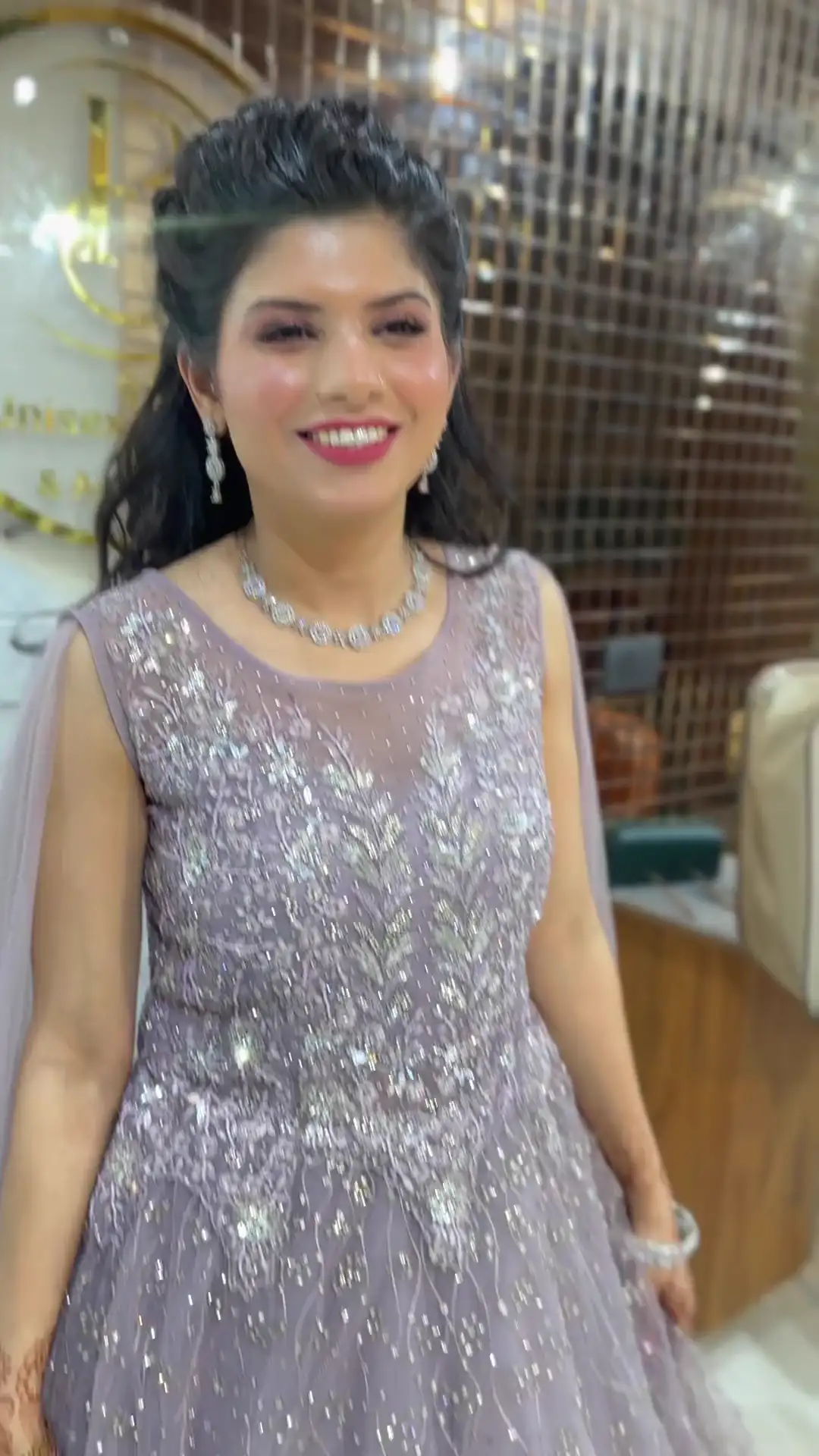 A client filmed at Salon By Babita, Haldwani, speaking about their visit — reference T-005