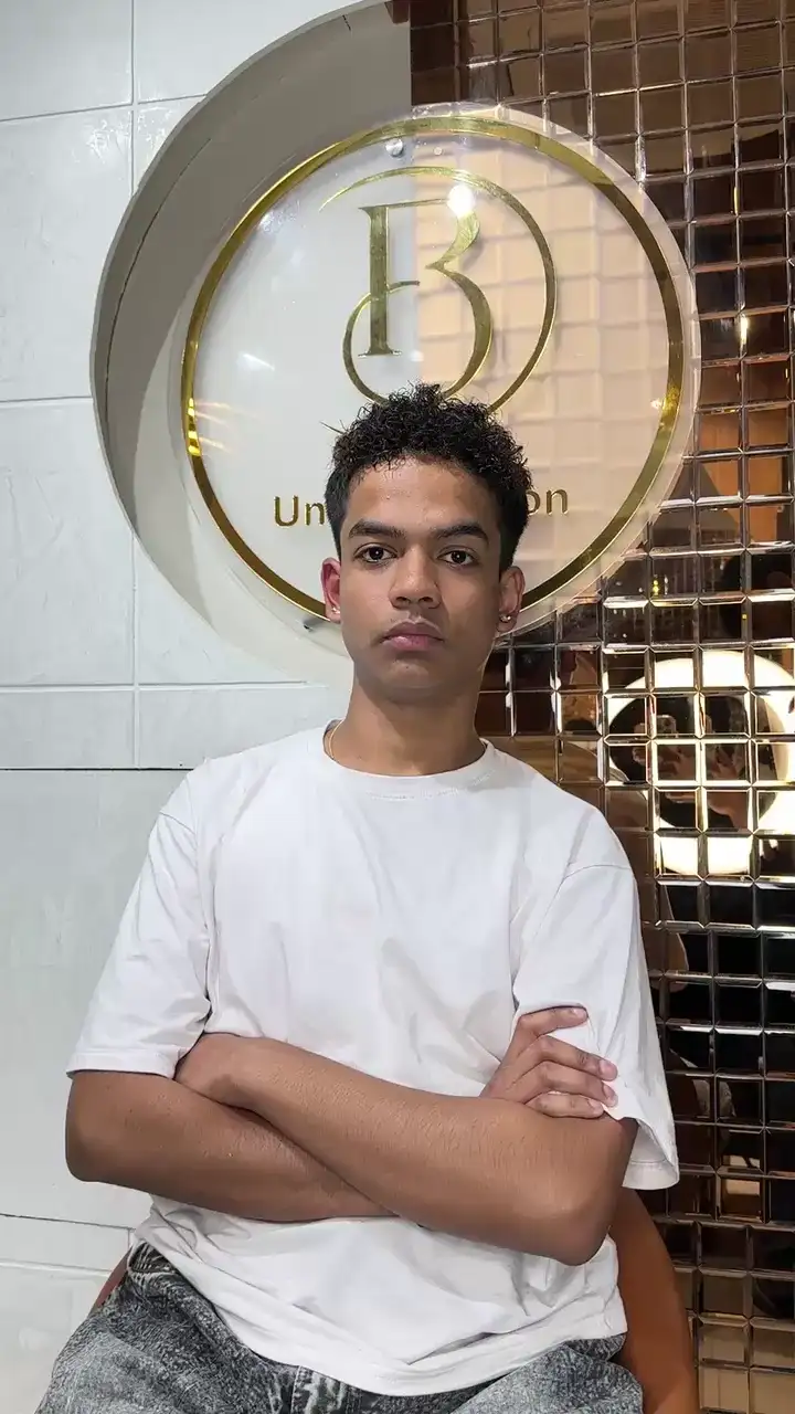 A client filmed at Salon By Babita, Haldwani, speaking about their visit — reference T-006